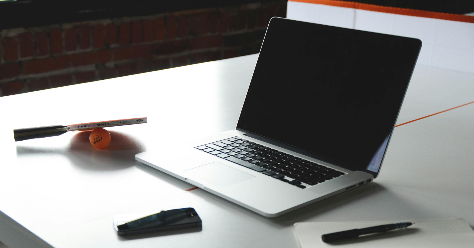 A photo of a MacBook on a table